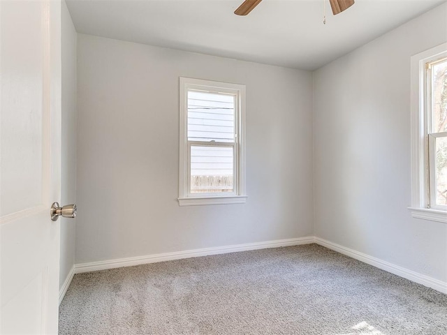 unfurnished room with carpet and a healthy amount of sunlight