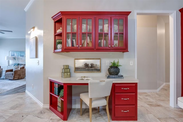 home office featuring crown molding and ceiling fan