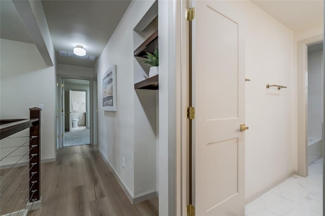 hall featuring light hardwood / wood-style floors