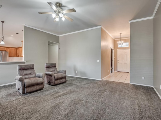 living area featuring ceiling fan with notable chandelier, light colored carpet, and ornamental molding