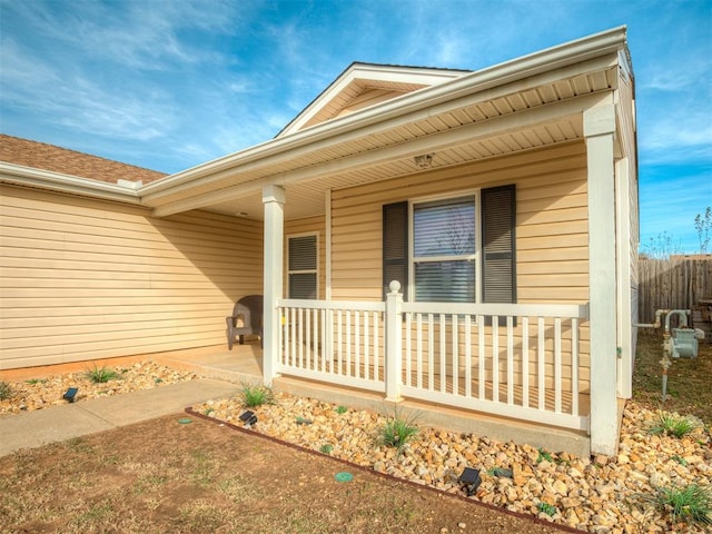 property entrance featuring a porch