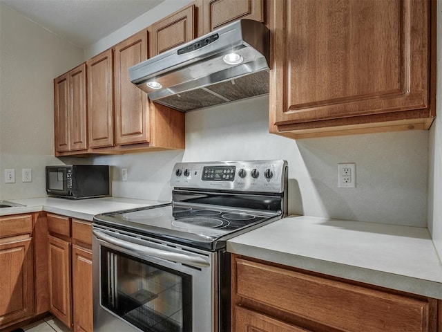 kitchen featuring stainless steel range with electric cooktop