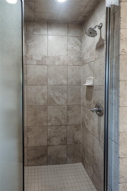 bathroom featuring an enclosed shower