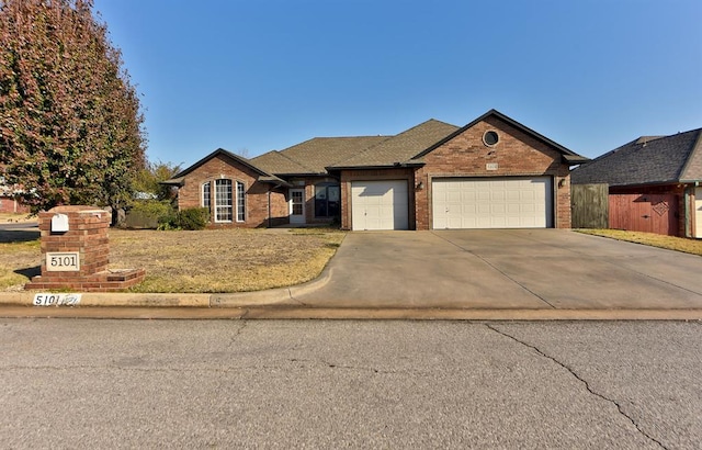 view of front of property with a garage