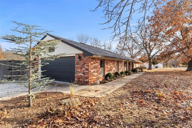 view of property exterior featuring a garage