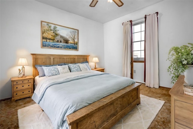 bedroom with ceiling fan and light carpet