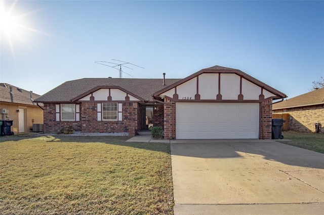 english style home with central air condition unit, a garage, brick siding, concrete driveway, and a front yard