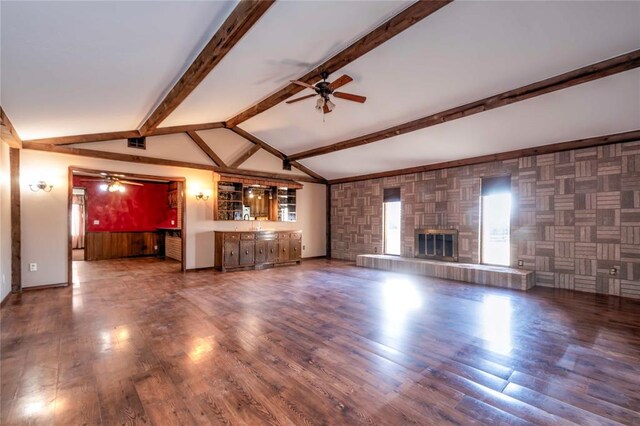 920173 S 3450th Rd, Chandler, OK 74834 - unfurnished living room with ceiling fan, wood finished floors, a glass covered fireplace, and baseboards