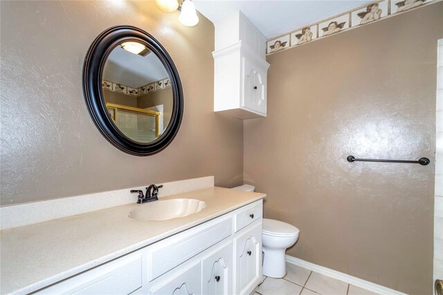 920173 S 3450th Rd, Chandler, OK 74834 - bathroom featuring vanity, toilet, tile patterned flooring, and a shower with door