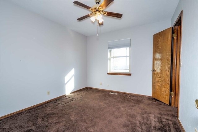 920173 S 3450th Rd, Chandler, OK 74834 - unfurnished bedroom with carpet floors, baseboards, and a ceiling fan