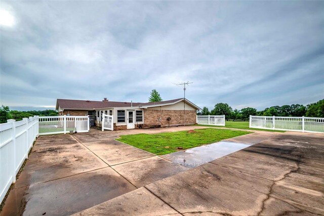 920173 S 3450th Rd, Chandler, OK 74834 - view of front facade featuring a patio and brick siding