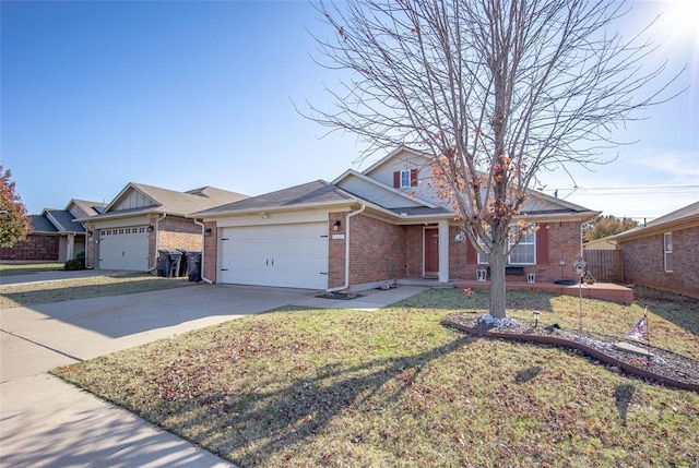 view of front of property featuring a front lawn and a garage