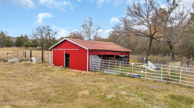 view of outdoor structure featuring a rural view