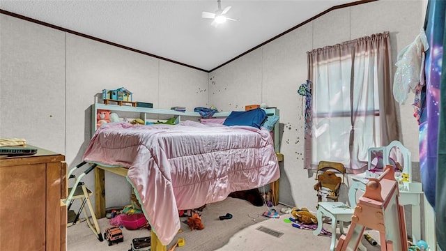 carpeted bedroom featuring ornamental molding, a textured ceiling, and lofted ceiling