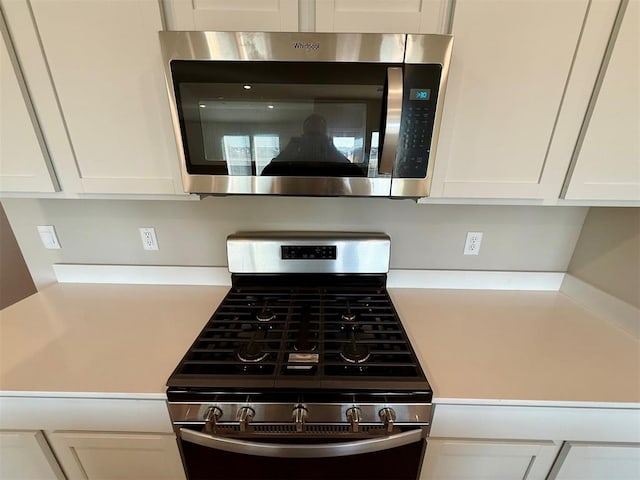 kitchen with white cabinets and stainless steel appliances