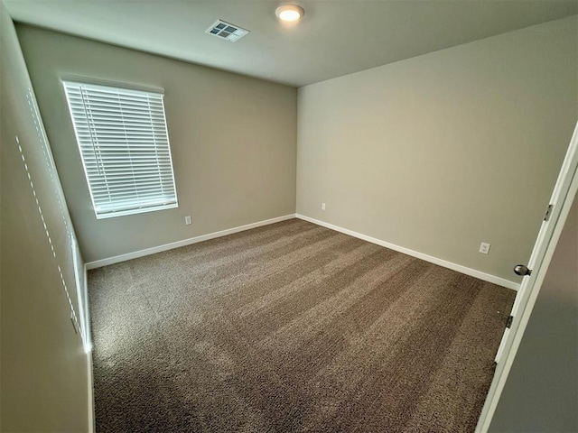 spare room with carpet flooring