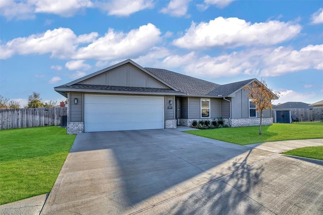 ranch-style home featuring a garage, a front lawn, and cooling unit