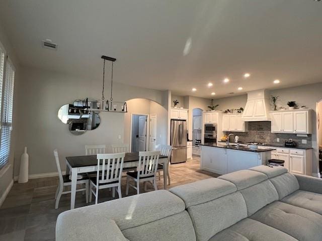 living room featuring sink