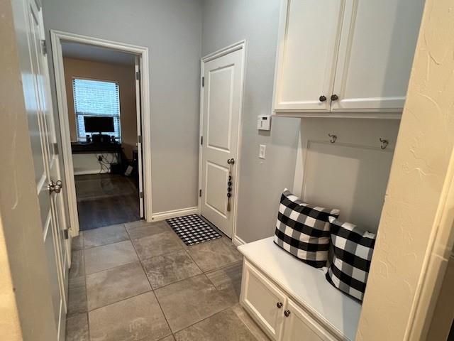 mudroom featuring light tile patterned floors