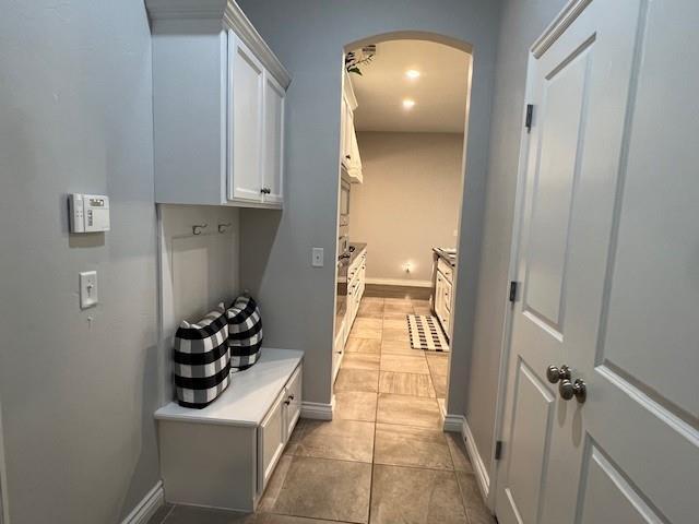 mudroom featuring light tile patterned floors