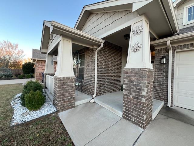 entrance to property with a porch