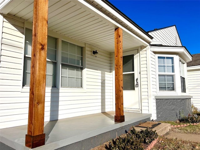 entrance to property with covered porch