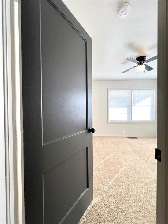 interior space featuring carpet flooring