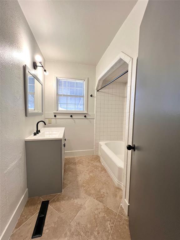 bathroom with vanity and tile patterned floors