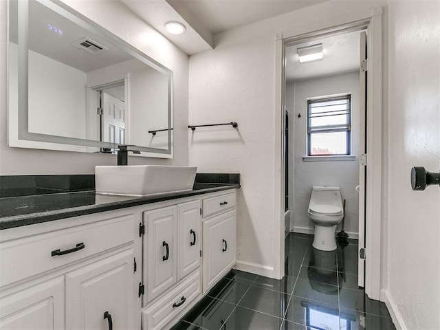 full bathroom featuring toilet, vanity, bathing tub / shower combination, and tile patterned floors