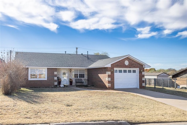 ranch-style house featuring a garage