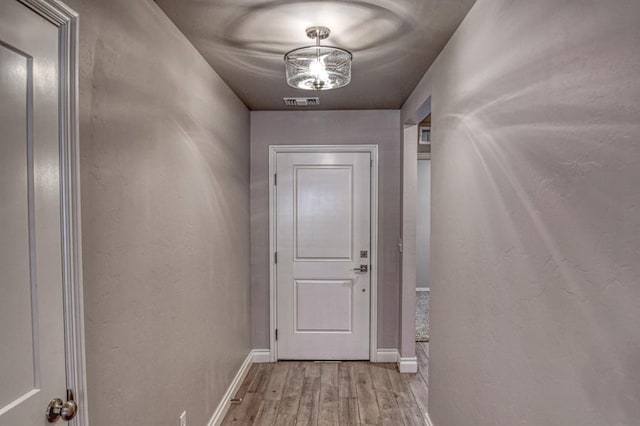 doorway featuring light hardwood / wood-style flooring