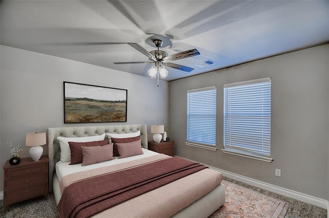 bedroom with ceiling fan and carpet flooring