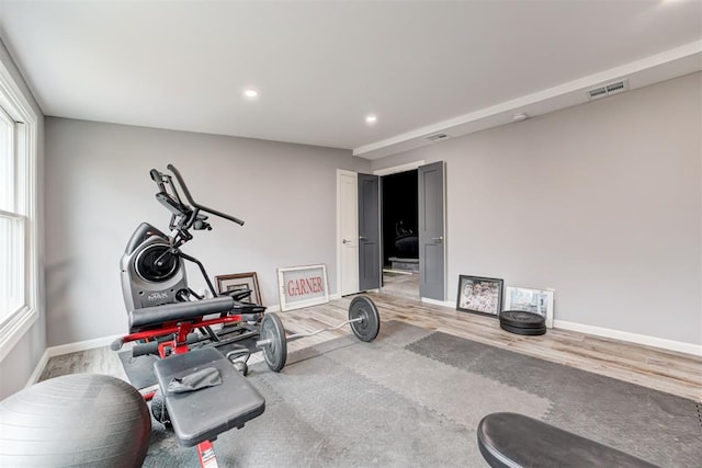 exercise area with hardwood / wood-style floors