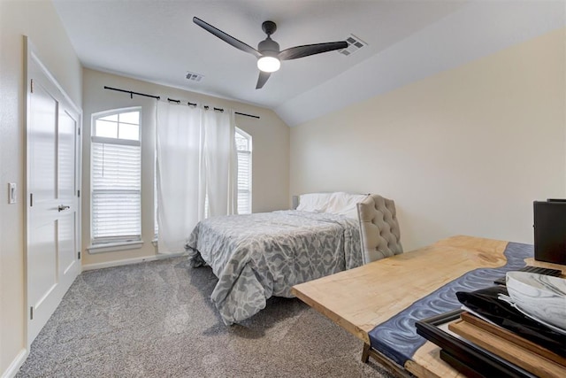 bedroom with carpet flooring, ceiling fan, and vaulted ceiling