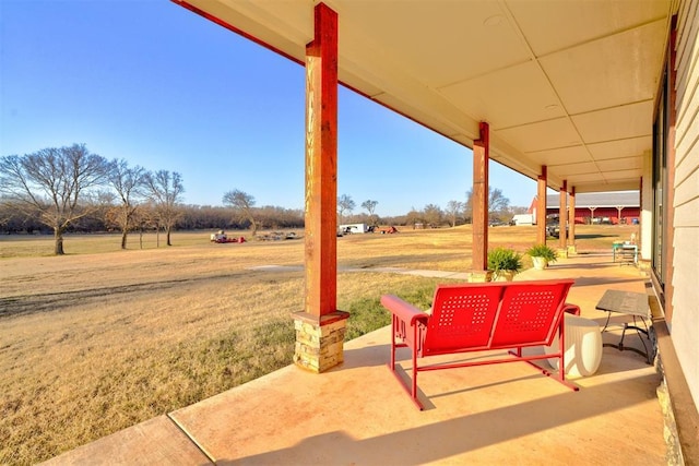 view of patio / terrace featuring a rural view