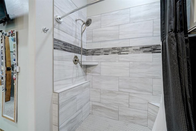 bathroom featuring curtained shower