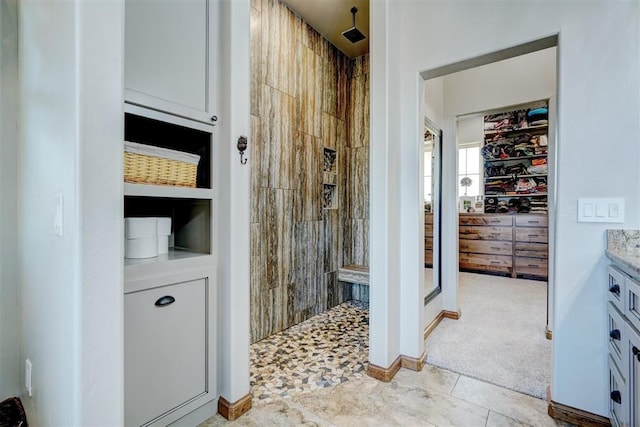 bathroom with vanity and walk in shower