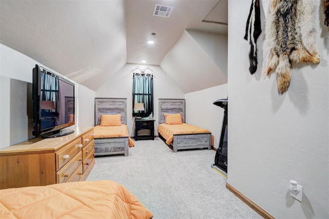 carpeted bedroom with lofted ceiling