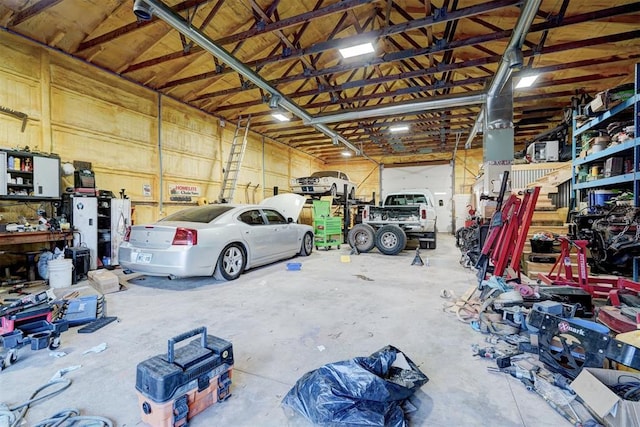 garage with a workshop area