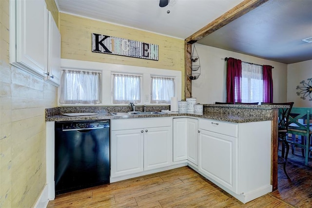 kitchen with dishwasher, light wood-type flooring, white cabinets, and kitchen peninsula