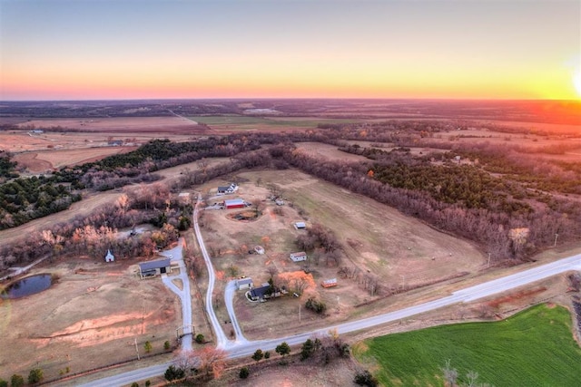 aerial view at dusk with a rural view