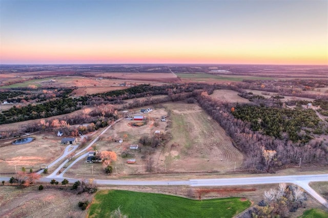 view of aerial view at dusk