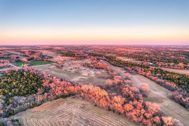 view of aerial view at dusk