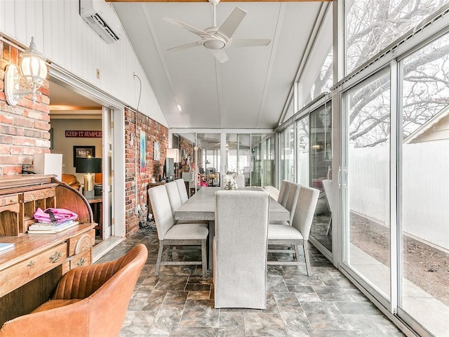 sunroom with ceiling fan, lofted ceiling, and a wall mounted air conditioner