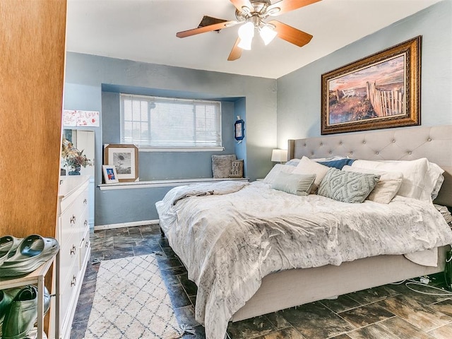 bedroom featuring ceiling fan