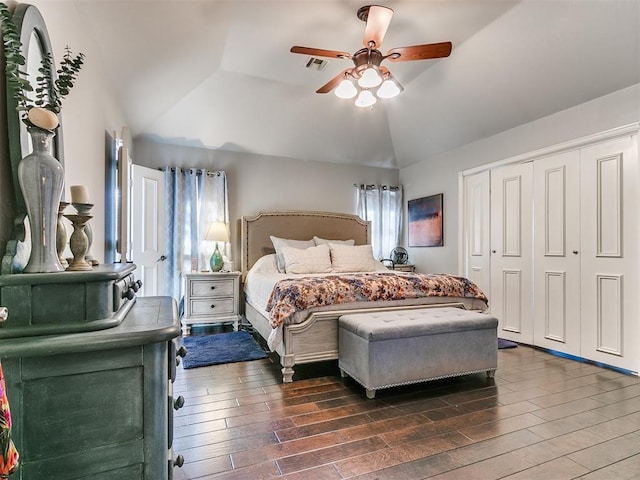 bedroom featuring ceiling fan, a closet, and vaulted ceiling