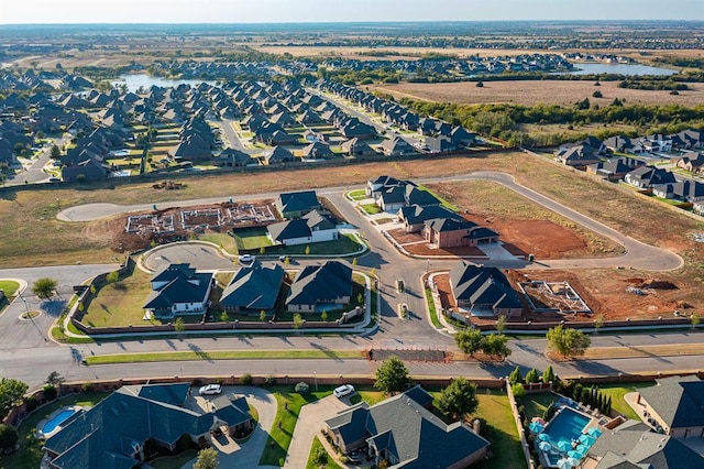 8409 NW 128th St, Oklahoma City, OK 73142 - aerial view of property's location featuring nearby suburban area and a large body of water