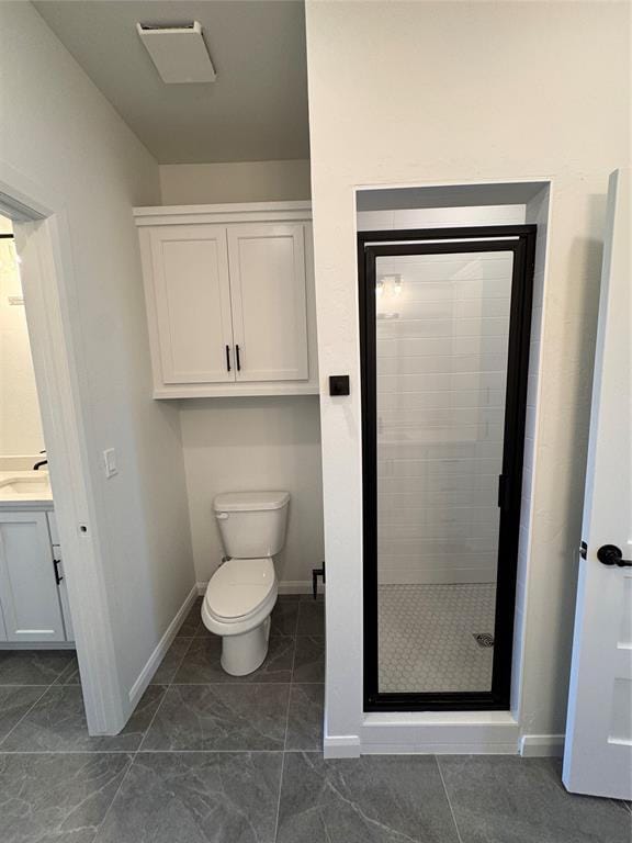 8409 NW 128th St, Oklahoma City, OK 73142 - full bath featuring a stall shower, vanity, baseboards, and toilet