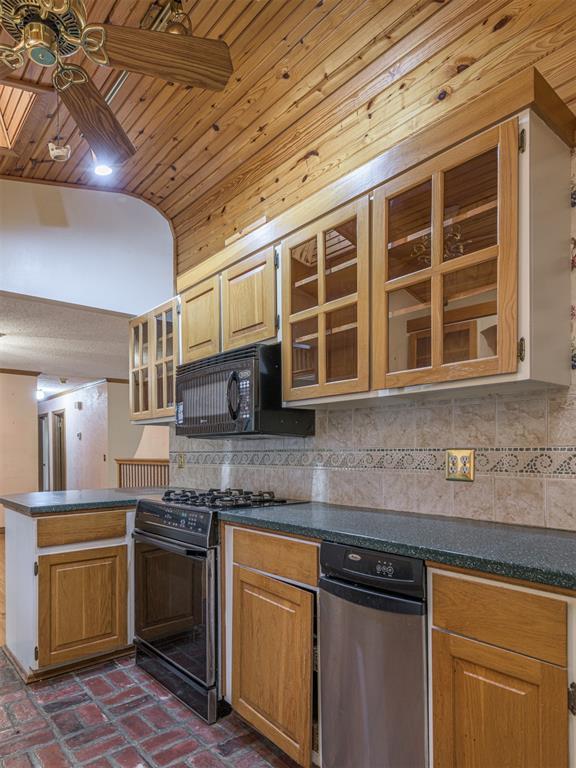 kitchen with wooden ceiling, black appliances, decorative backsplash, ceiling fan, and kitchen peninsula