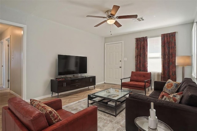 living room with ceiling fan